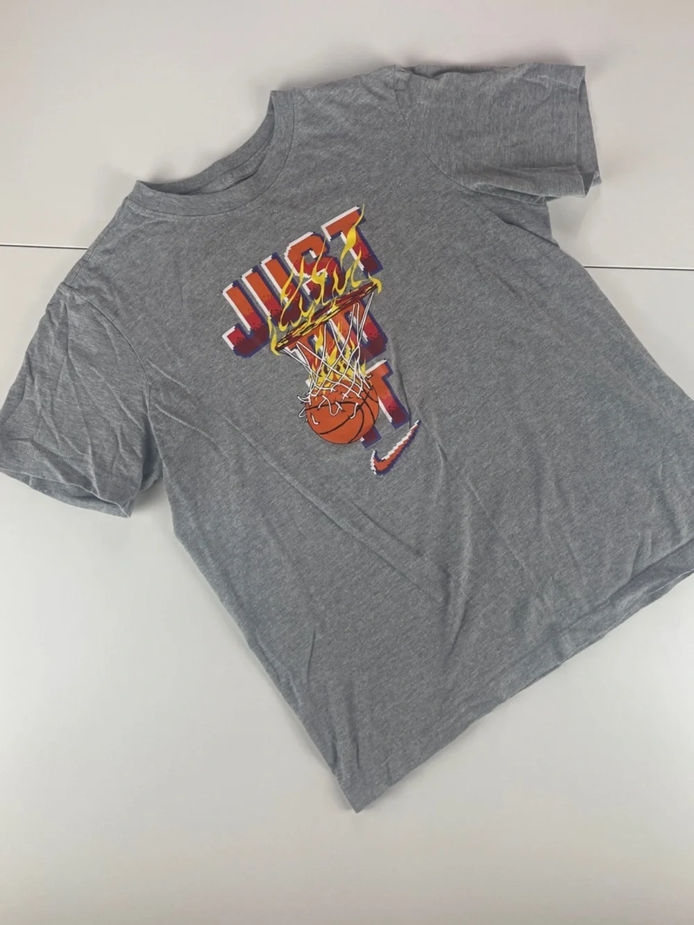 Nike Grey Short-Sleeve 'Just Do It' Basketball Graphic Tee with Orange Accents